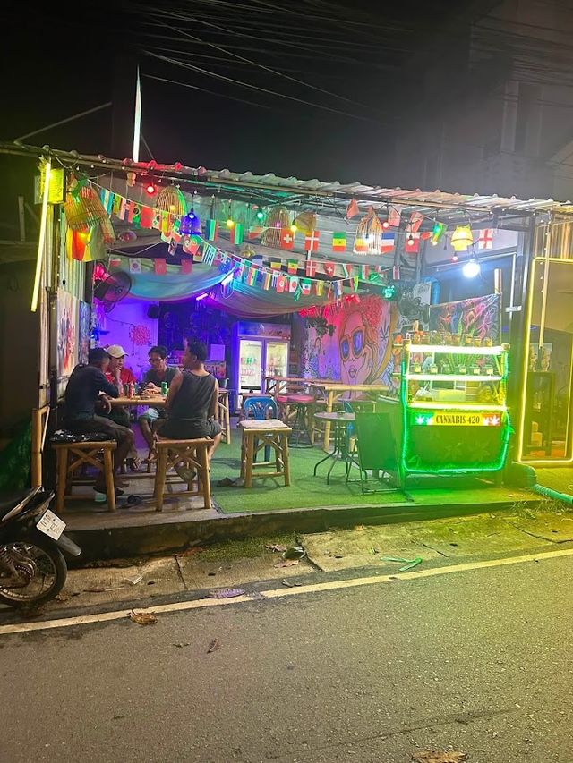 Open Reggae bar cannabis shop and art gallery storefront
